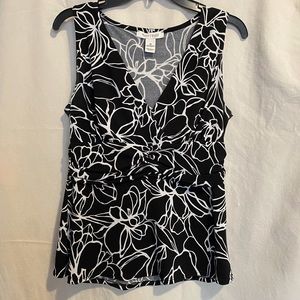 White floral print on blk stretch blend.